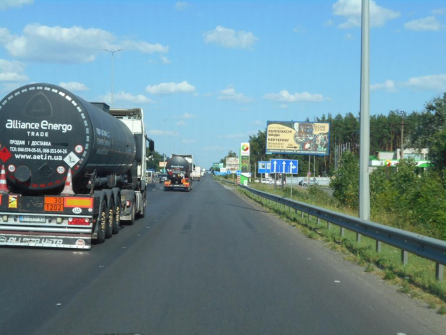 Щит 6x3,  с. Мила, траса М-06 "Київ-Чоп" (Житомир), км 25+000 ліво
