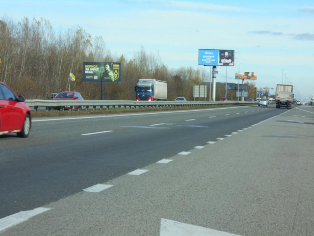 Щит 6x3,  с. Мила, траса М-06 "Київ-Чоп" (Житомир), км 27+100 право