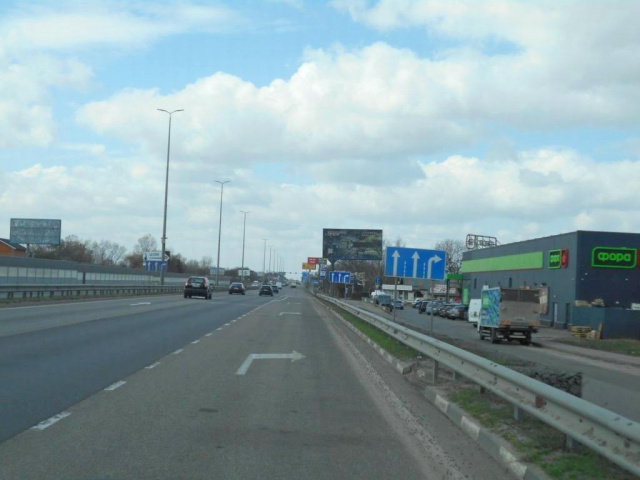 Щит 6x3,  с. Мила, траса М-06 "Київ-Чоп" (Житомир), км 26+200 ліво