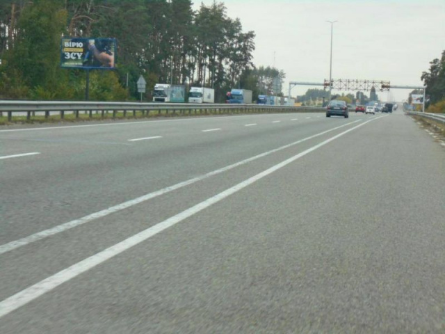 Щит 6x3,  с. Бузова, траса М-06 "Київ-Чоп" (Житомир), км 36+150 ліво