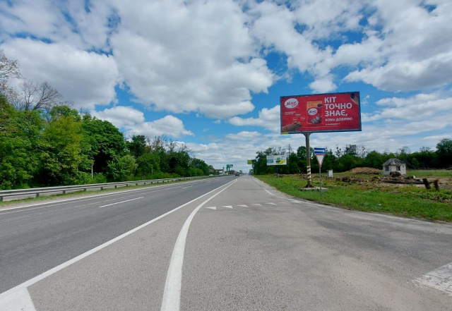 Щит 6x3,  с. Мила, траса М-06 "Київ-Чоп" (Житомир), км 27+900 ліво