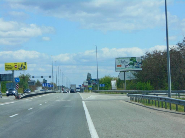 Щит 6x3,  с. Мила, траса М-06 "Київ-Чоп" (Житомир), км 26+950 ліво