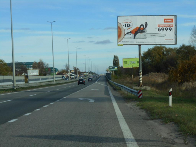 Щит 6x3,  с. Мила, траса М-06 "Київ-Чоп" (Житомир), км 26+650 ліво