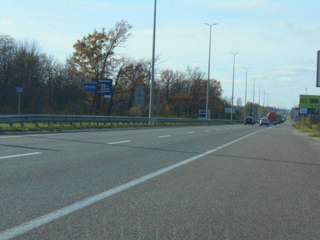 Щит 6x3,  с. Мрія, траса М-06 "Київ-Чоп" (Житомир), км 30+100 ліво