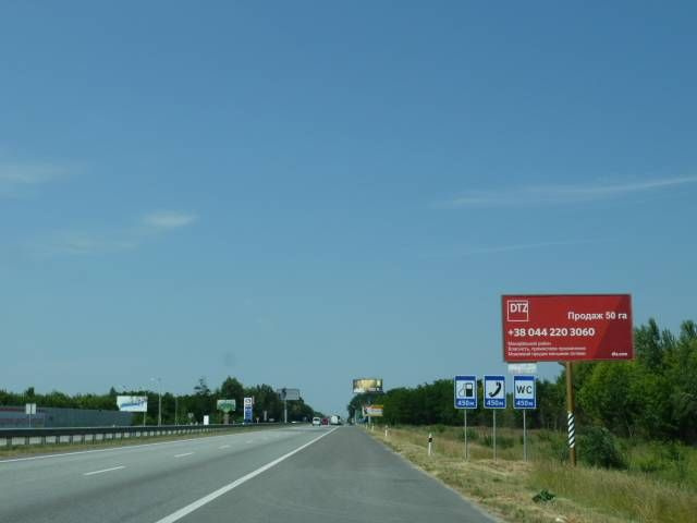 Щит 6x3,  с. Мила, траса М-06 "Київ-Чоп" (Житомир), км 27+050 право