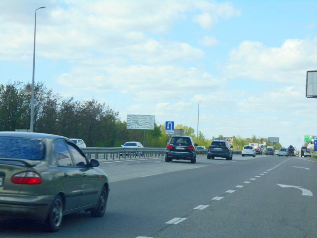 Щит 6x3,  с. Мила, траса М-06 "Київ-Чоп" (Житомир), км 26+950 ліво