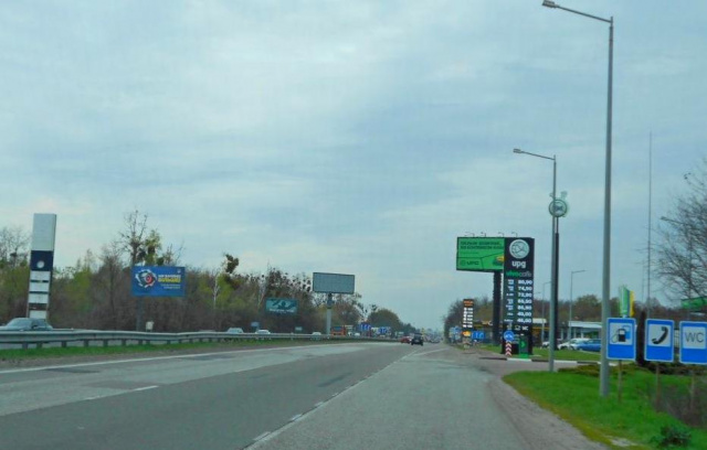 Щит 6x3,  с. Мила, траса М-06 "Київ-Чоп" (Житомир), км 27+100 ліво