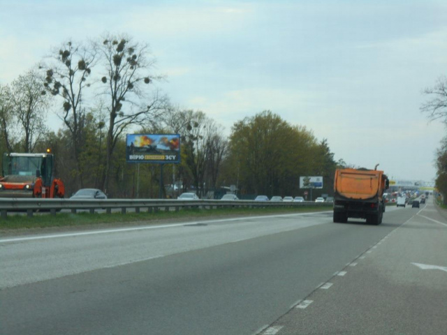 Щит 6x3,  с. Мила, траса М-06 "Київ-Чоп" (Житомир), км 27+900 ліво