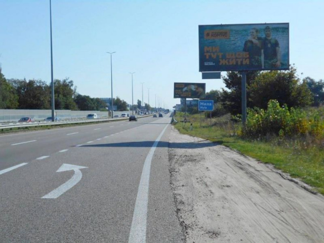 Щит 6x3,  с. Мила, траса М-06 "Київ-Чоп" (Житомир), км 26+800 ліво