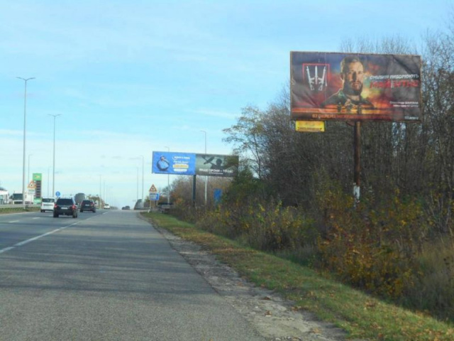 Щит 6x3,  с. Мрія, траса М-06 "Київ-Чоп" (Житомир), км 30+100 ліво